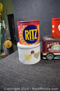 12 Advertisement Tins
