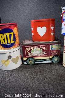 12 Advertisement Tins