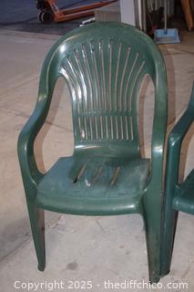 2 Green Plastic Chairs