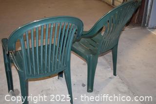 2 Green Plastic Chairs