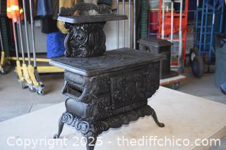 Cast Iron Stove-17 1/2 in x 10 1/2in x 21 1/2in-opening 6 1/2in x 4in