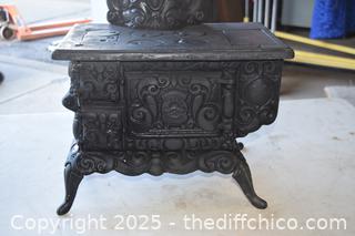 Cast Iron Stove-17 1/2 in x 10 1/2in x 21 1/2in-opening 6 1/2in x 4in