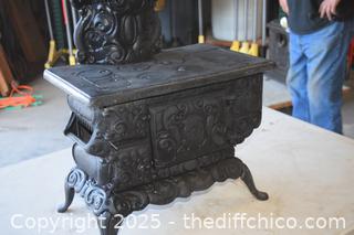 Cast Iron Stove-17 1/2 in x 10 1/2in x 21 1/2in-opening 6 1/2in x 4in