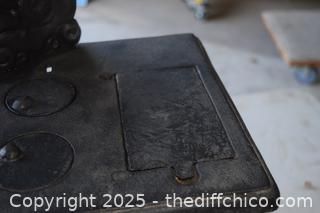 Cast Iron Stove-17 1/2 in x 10 1/2in x 21 1/2in-opening 6 1/2in x 4in