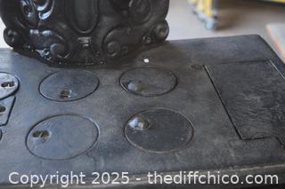 Cast Iron Stove-17 1/2 in x 10 1/2in x 21 1/2in-opening 6 1/2in x 4in