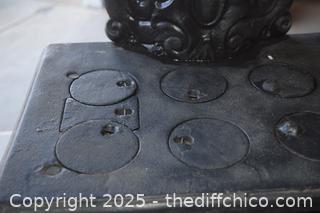 Cast Iron Stove-17 1/2 in x 10 1/2in x 21 1/2in-opening 6 1/2in x 4in