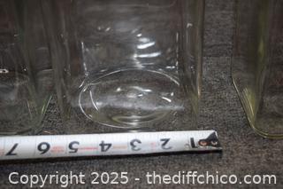 4 Clear Glass Canisters plus Lids
