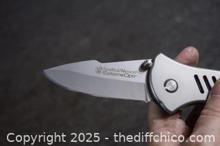 4 Knives-Buck, Kershaw and Smith and Wesson