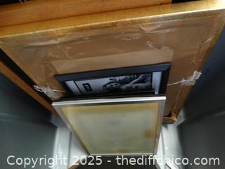 Gray Tub Of Picture Frames 