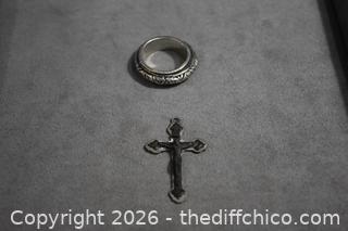 Cross and Spinning Ring